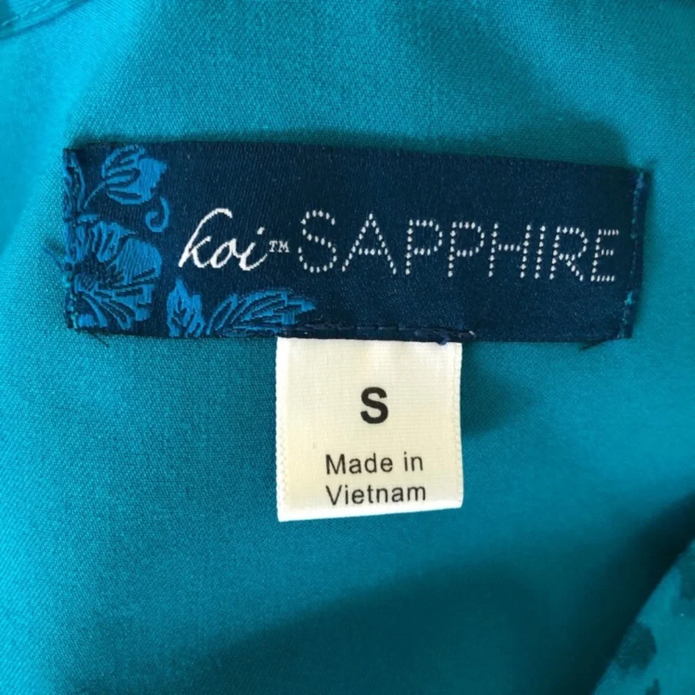 Koi Sapphire blue/gray animal print scrubs top. - Picture 6 of 7